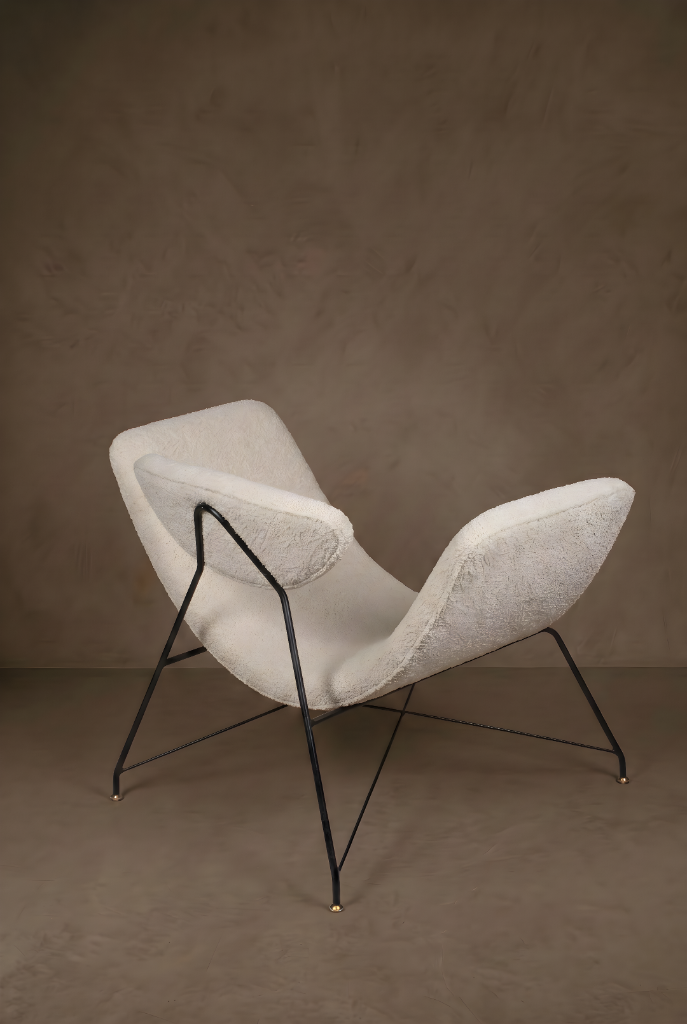 Reversível Lounge Chair Bouclé by Hauner & Eisler, bouclé upholstery, black metal frame