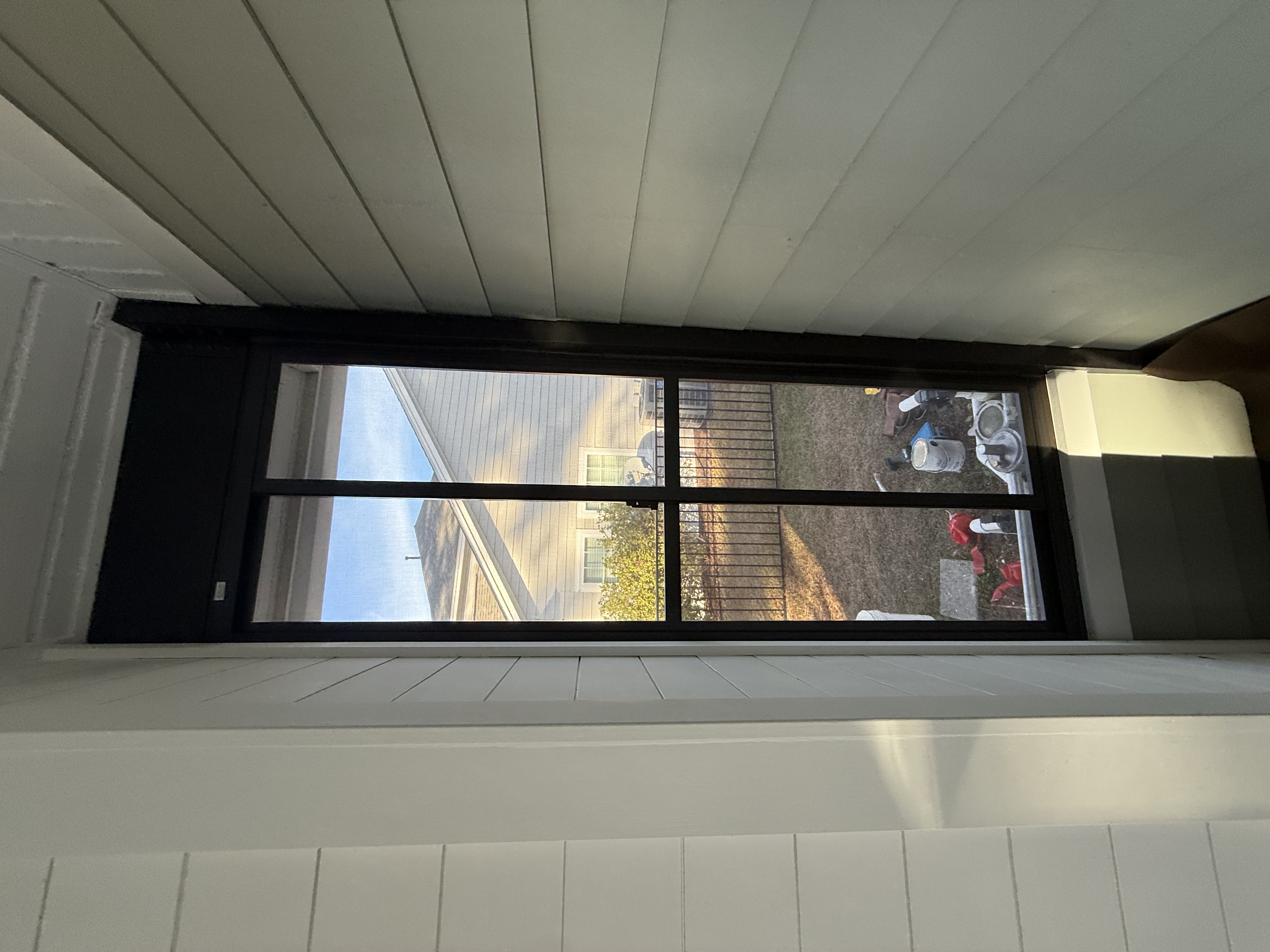 Screen Porch Framing the Backyard