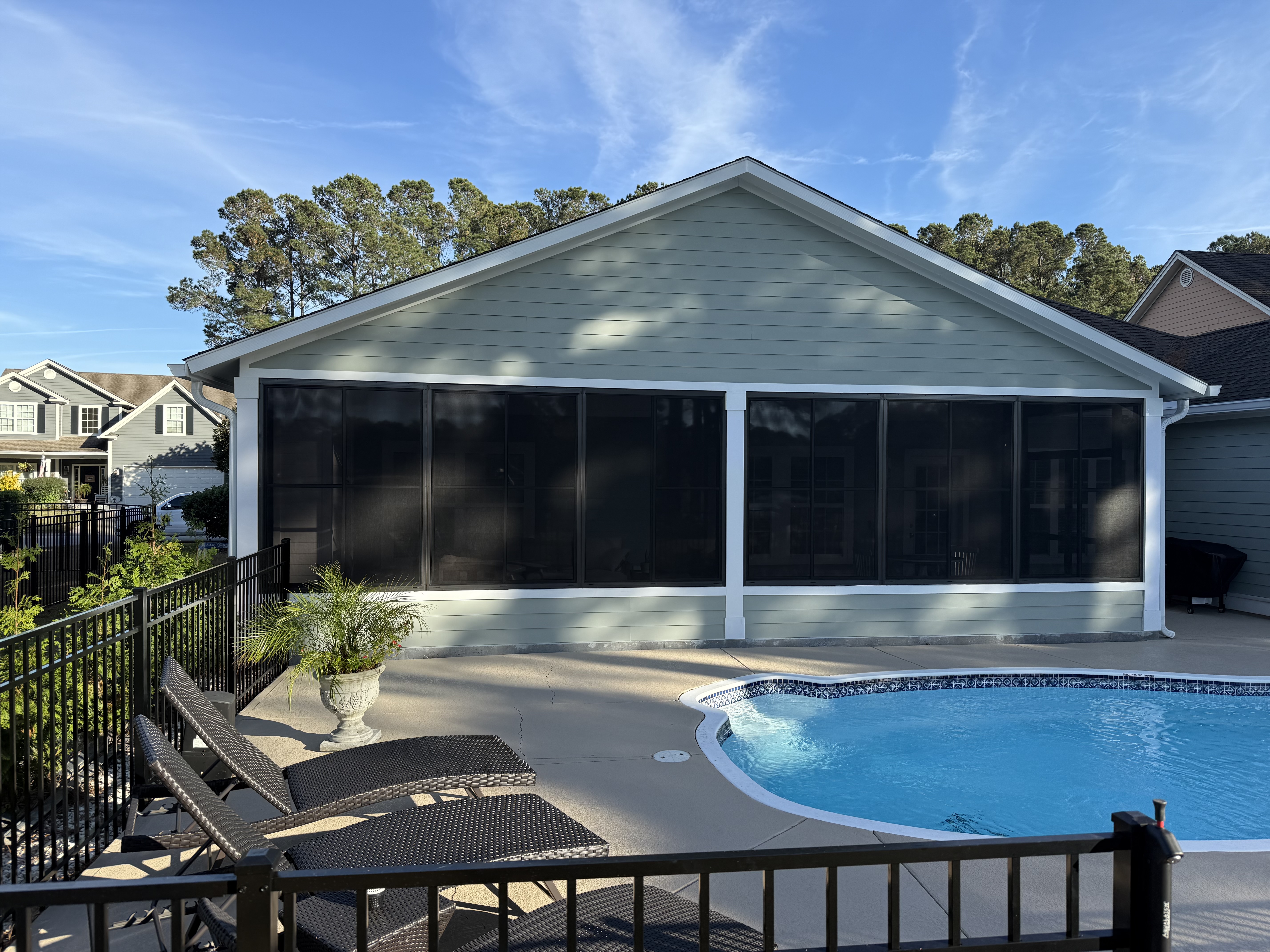 Sage Green Screen Porch Retreat