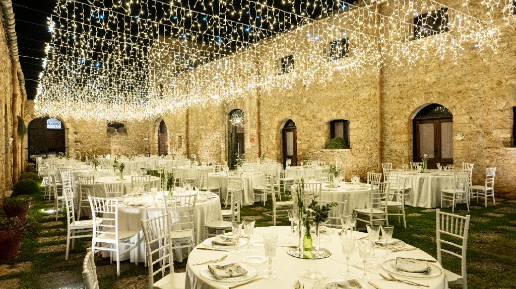 Borgo degli Angeli historic courtyard lit for weddings in Sicily