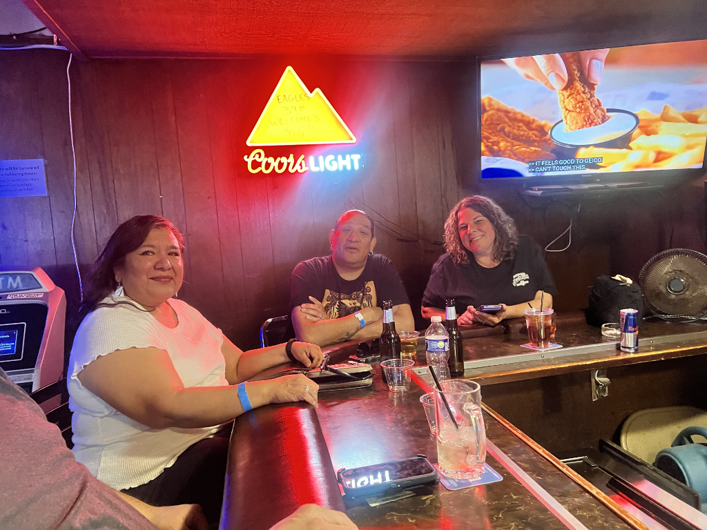 Members Enjoying Time at the Bar