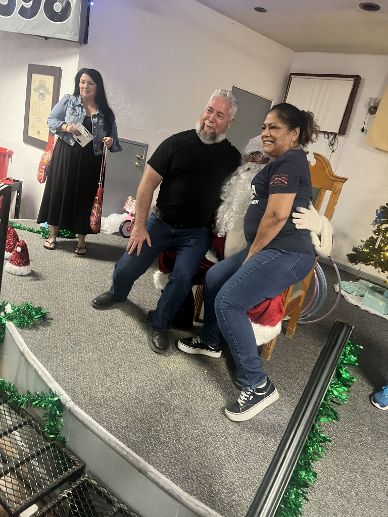 Members Celebrating with Santa
