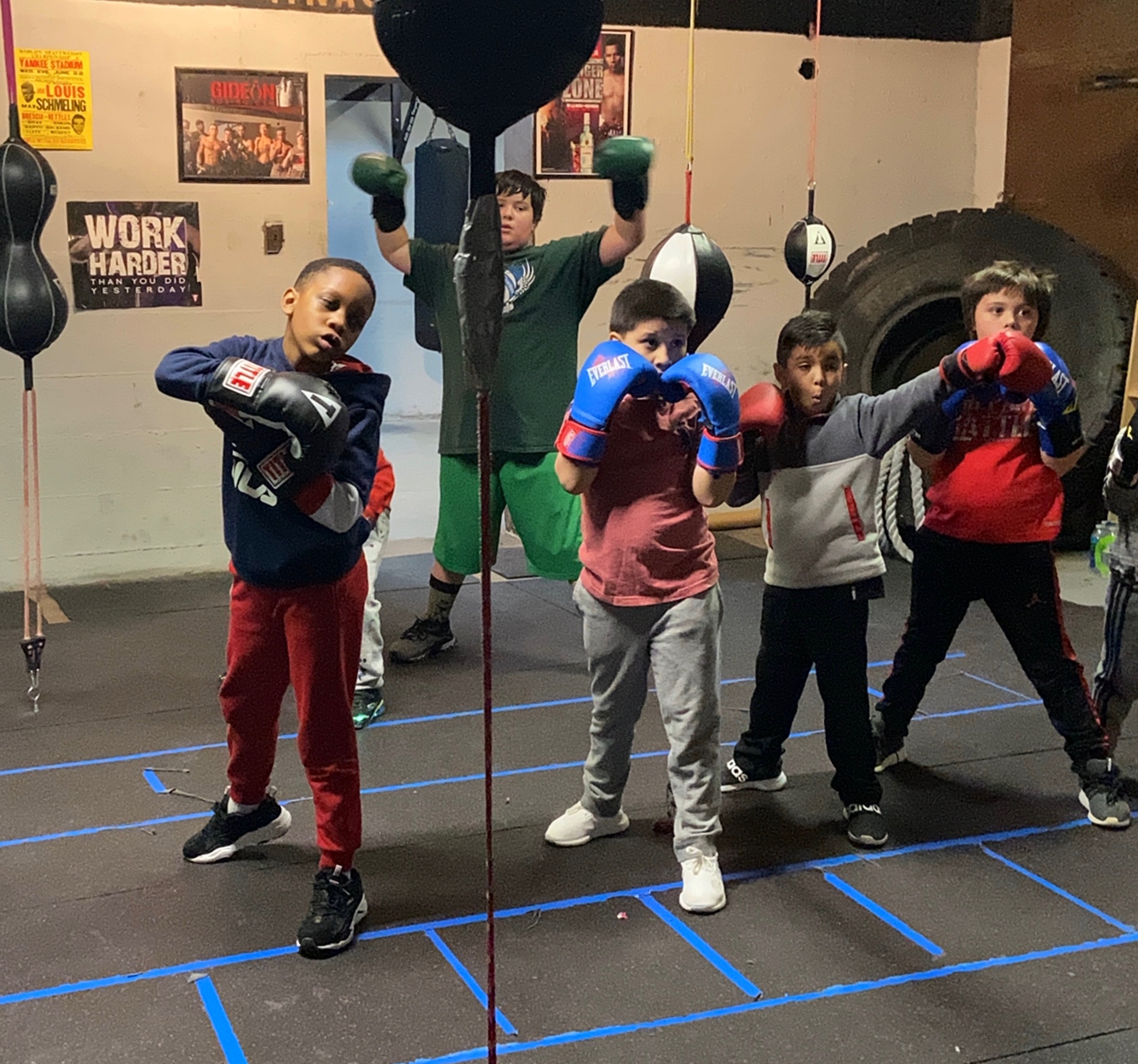 Youth boxers on the bags