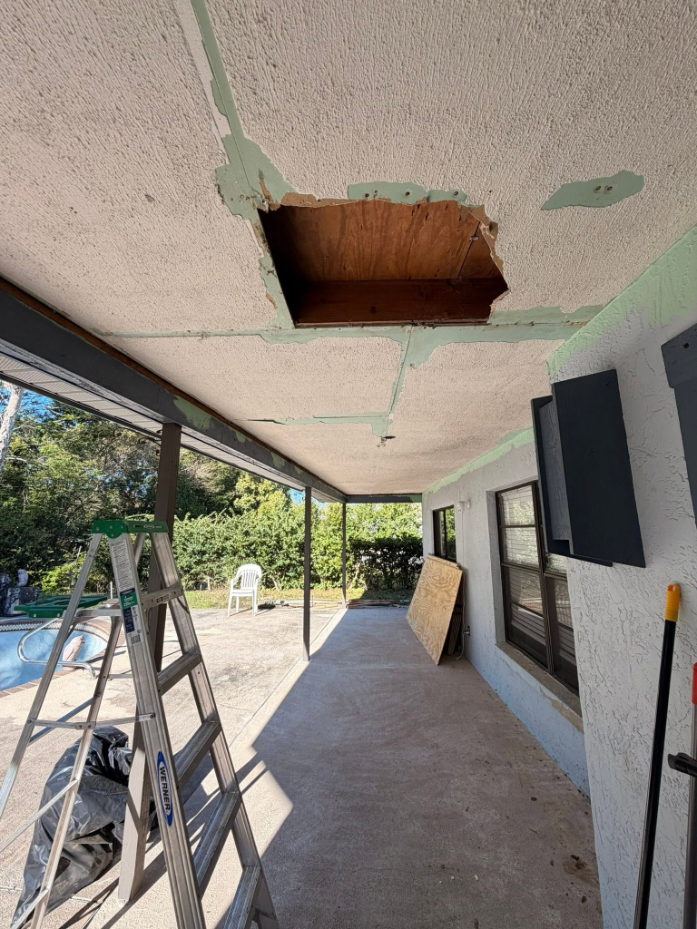 Before: Deck and patio ceiling repair in Crystal River FL - damaged stucco ceiling rebuilt with new wood planks