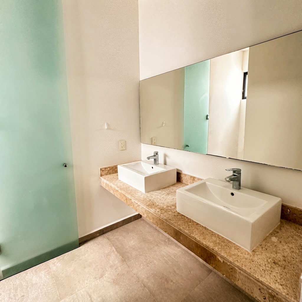 Jardín y alberca de la Casa Única en Residencial San José Tulipanes, Mérida