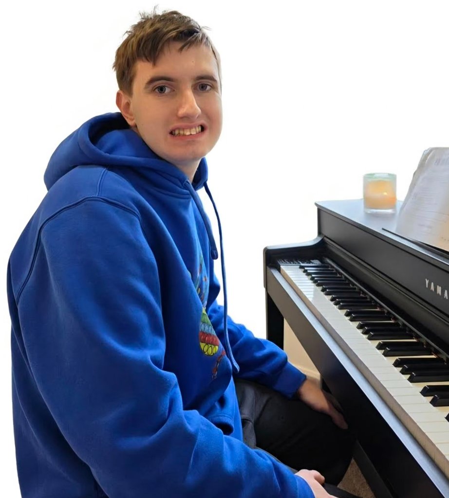 Dominic at the piano