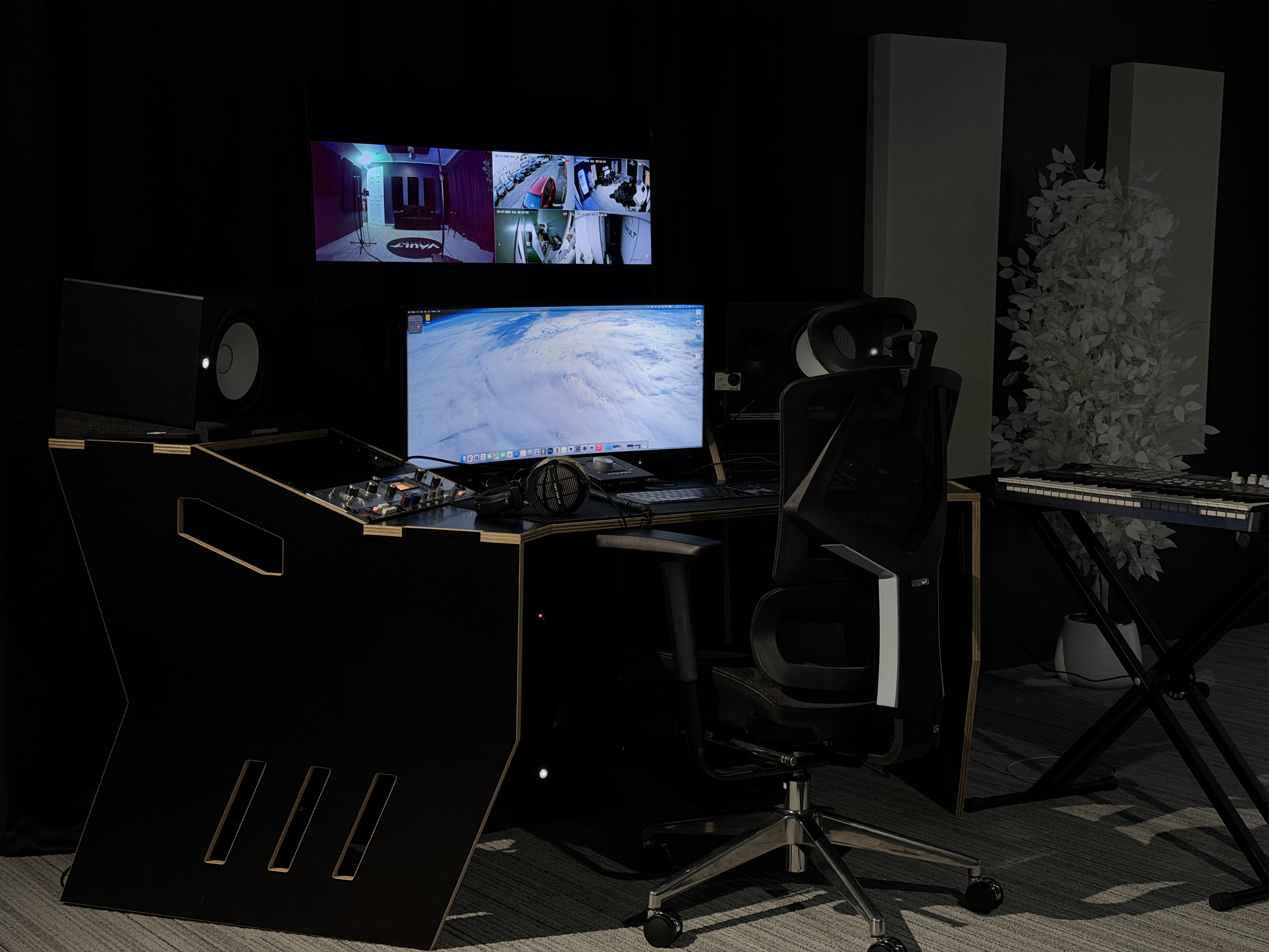 Production desk with monitors and keyboard