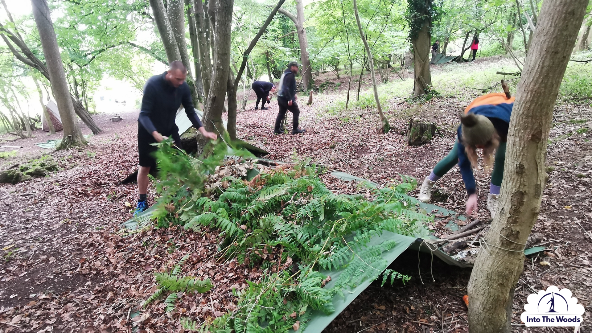 Shelter building workshop at an Into the Woods corporate event