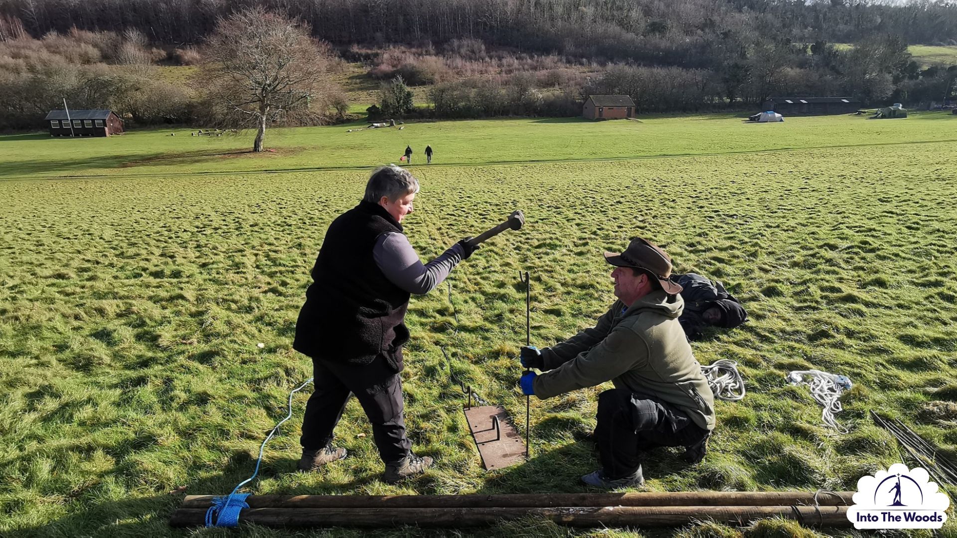 Tool Skills & Safety team building Kent - corporate group working together in woodland