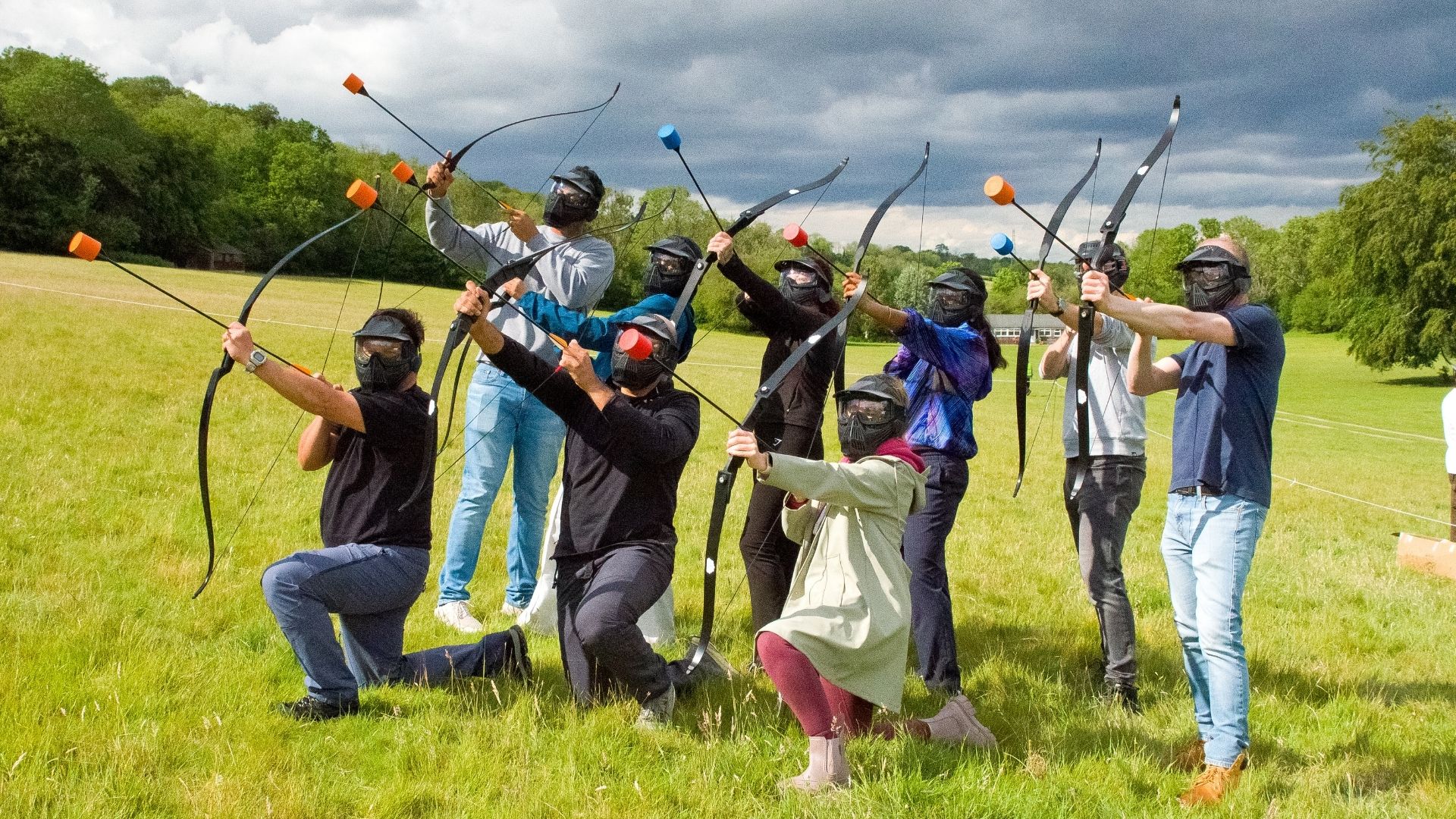 Archery team activity at an Into The Woods bushcraft weekend in Kent