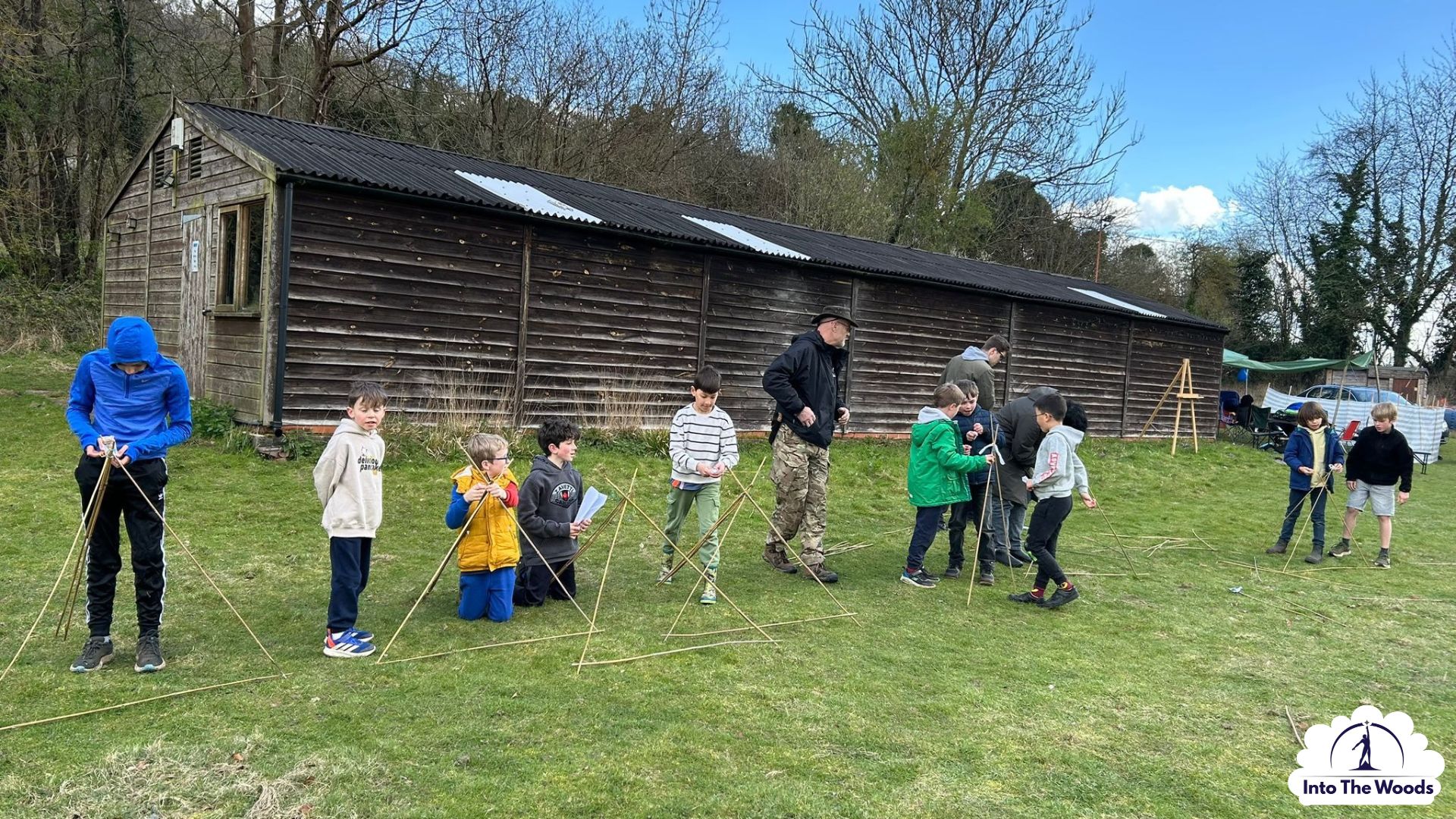 Wellness Days team building Kent - corporate group working together in woodland