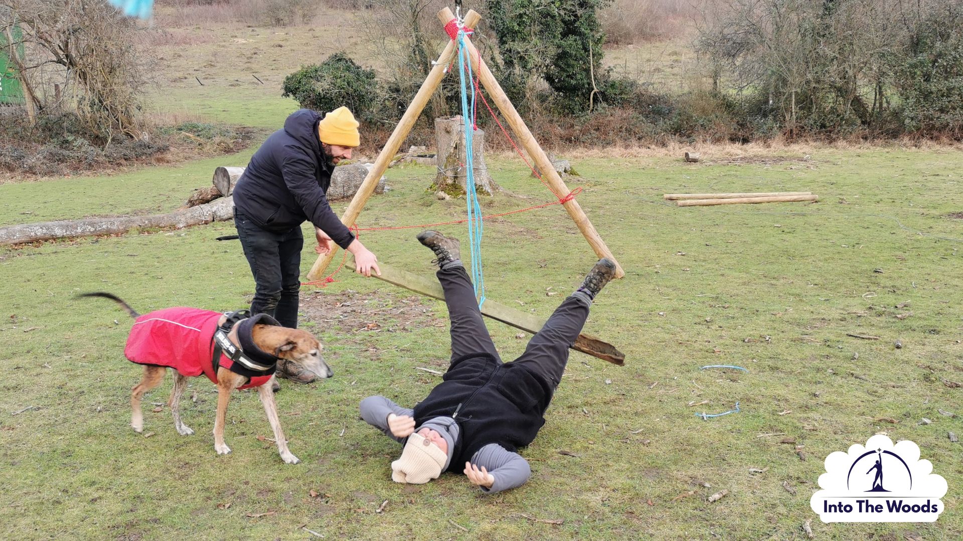 Zipline Building Kent - participant riding a self-built zipline in an open field