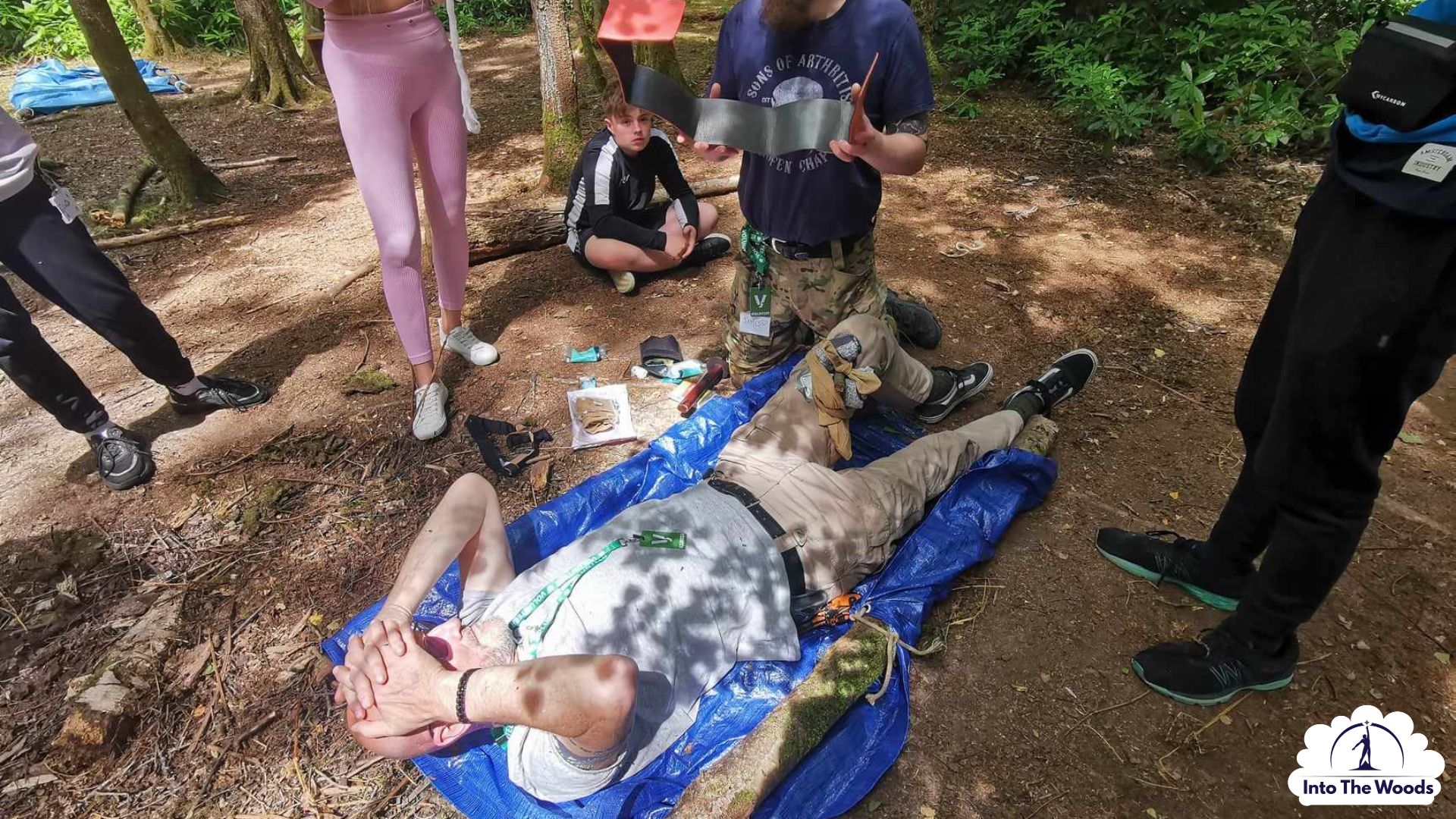 Command Tasks Kent - participants enjoying the activity in woodland