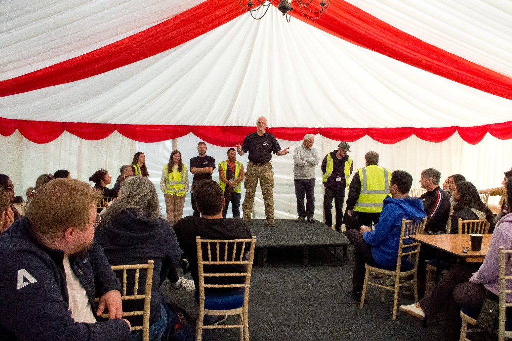 Into The Woods corporate event - team briefing inside a marquee