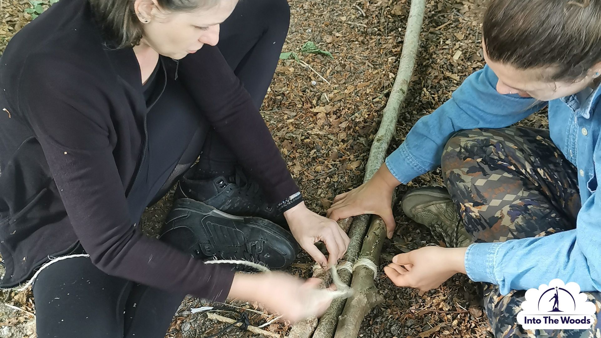 Prepping Kent - hands sorting through a bushcraft survival kit