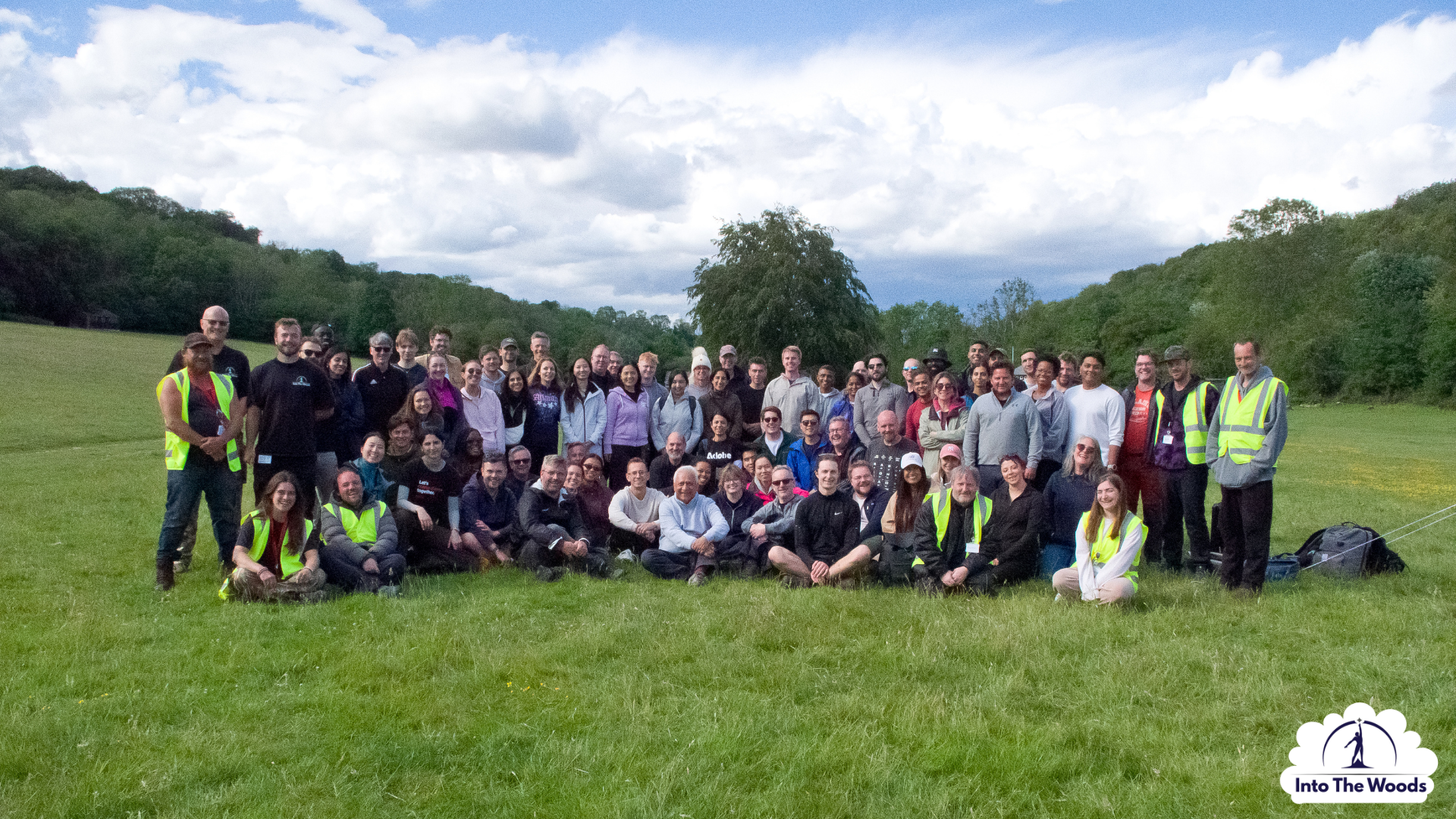 Corporate team building group photo at an Into the Woods event