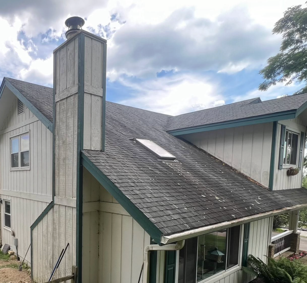 asphalt roof soft wash removing black algae streaks before cleaning in Boone, NC