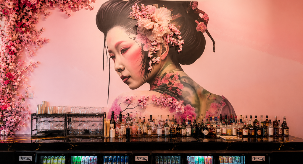 Sakura bar interior with cherry blossoms and Japanese-inspired artwork