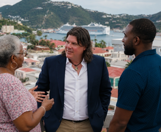 Gregory P. Smith speaking with residents overlooking Charlotte Amalie harbor, St. Thomas