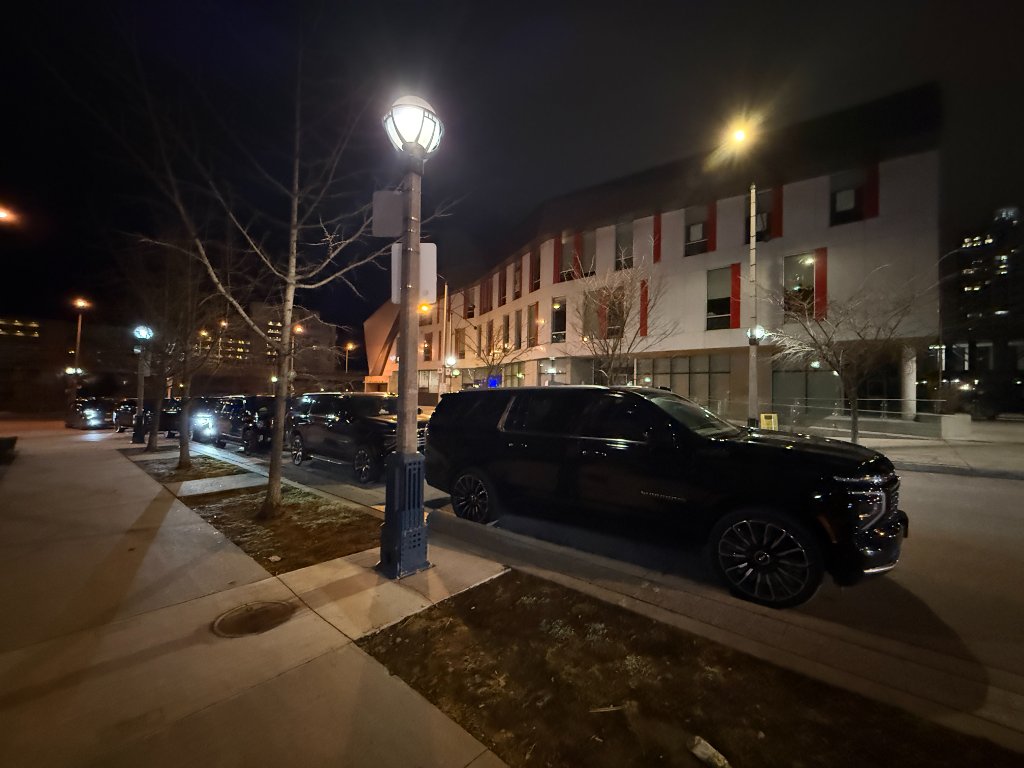 VIP Black Limo Fleet - Black SUVs at Night
