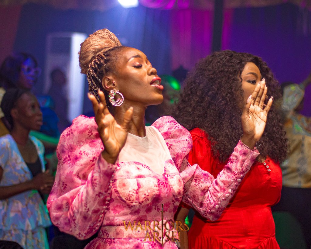 Warriors Arise 2024 — Praise team leading worship on stage