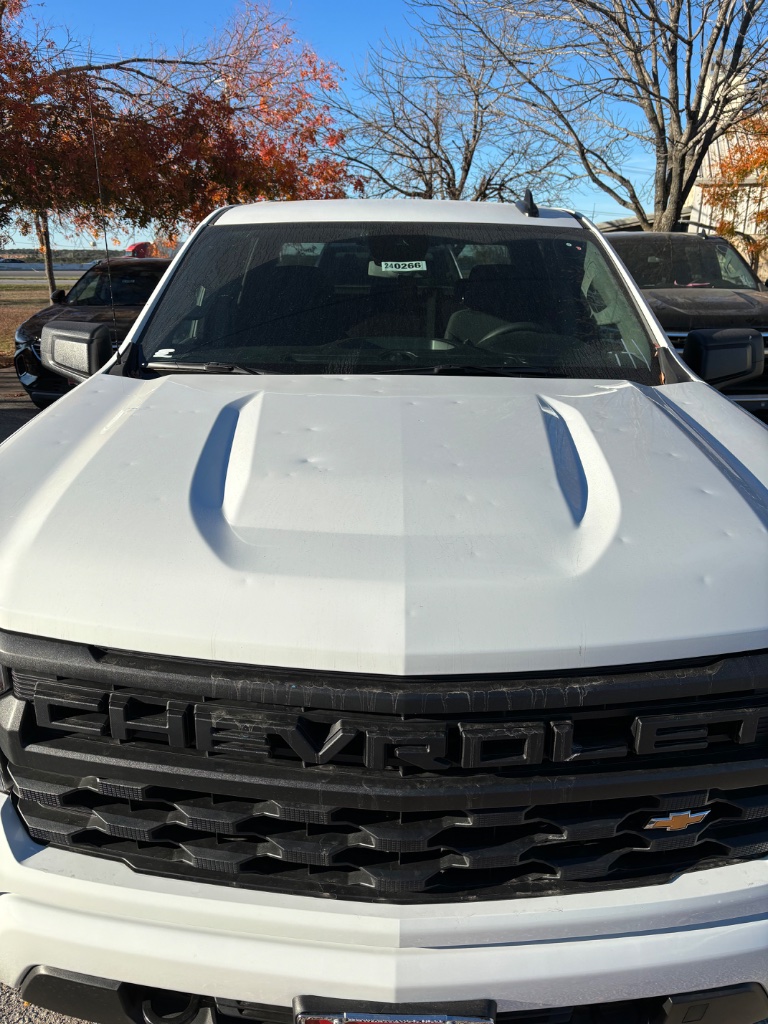Vehicle with hail damage being inspected by Texas Hail Experts in Central Texas