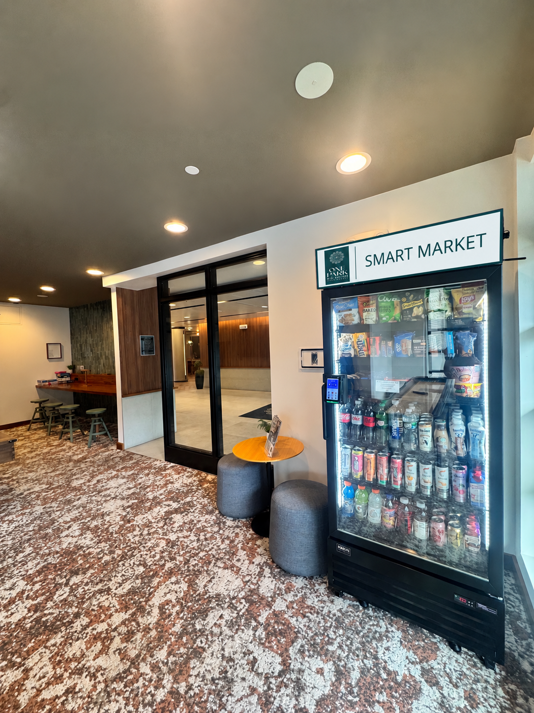 Smart Market glass-fronted vending machine in a modern lounge
