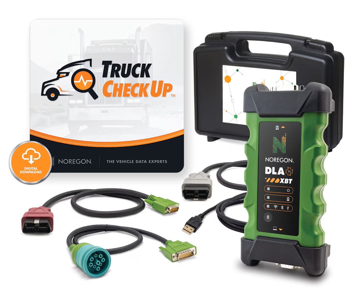 Close-up of OBD diagnostic equipment connected to a heavy-duty truck engine