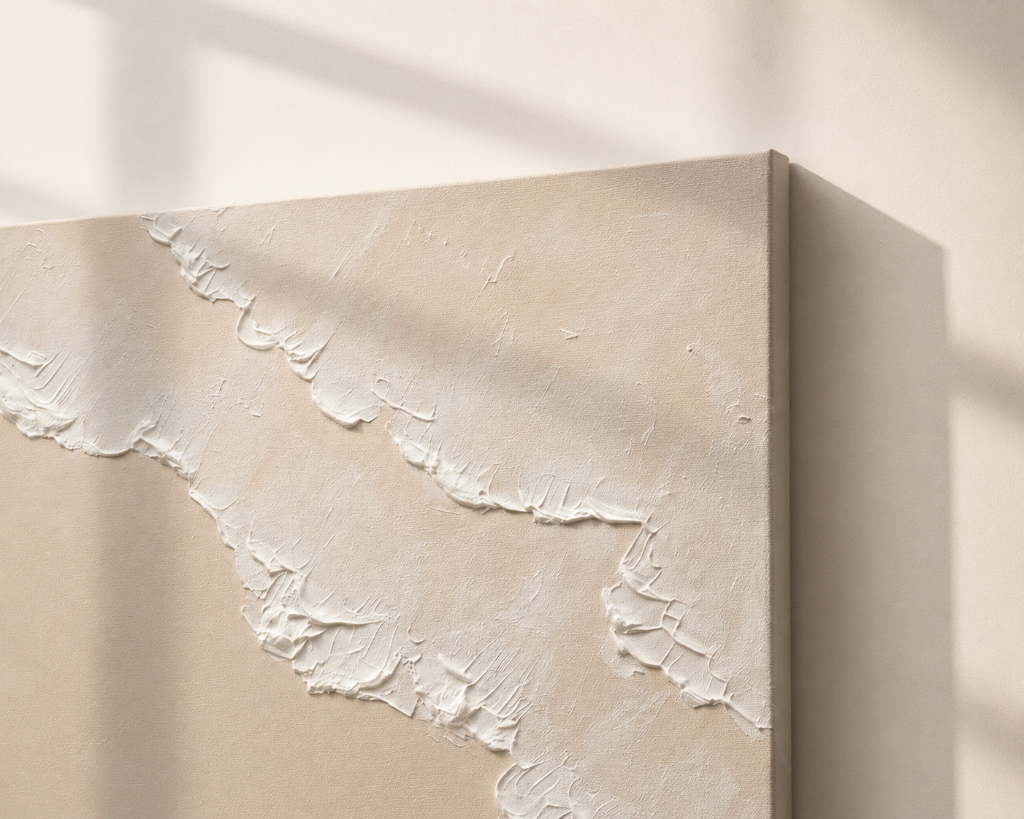 Minimalist sand-beige painting with a raised white textured wave shape and a sculpted white starfish detail.