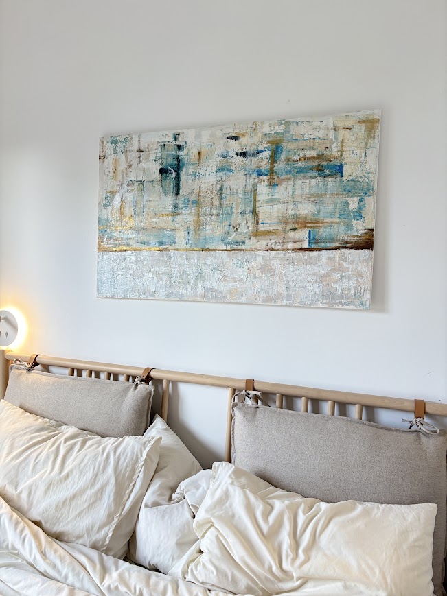 Textured abstract painting with weathered teal, sage-blue, gold and white horizontal brushstrokes.