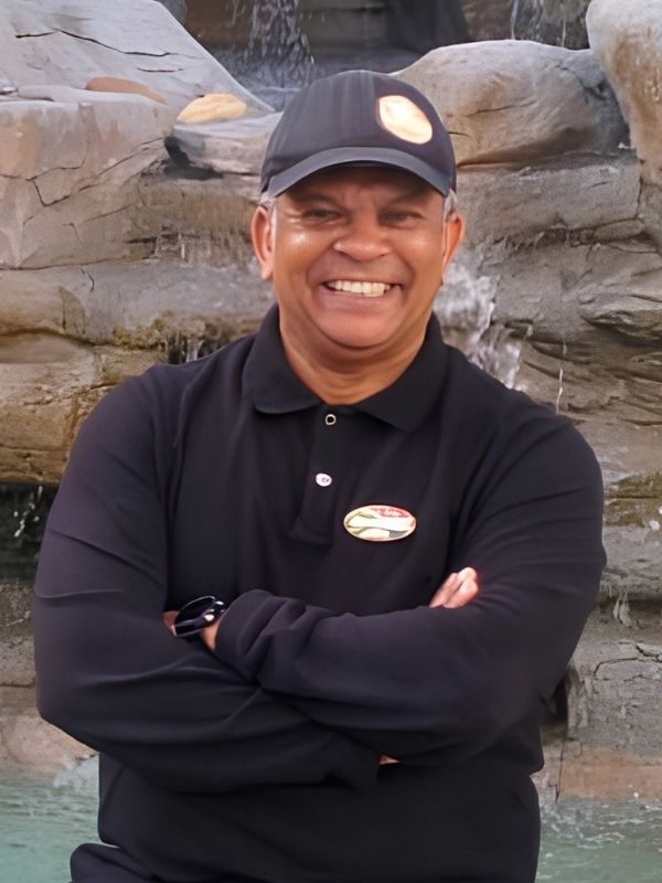 Donovan Shaw, founder of Along the Shaws and registered Western Cape tourist guide, smiling in Cape Town while representing personalised private tours and local travel experiences.