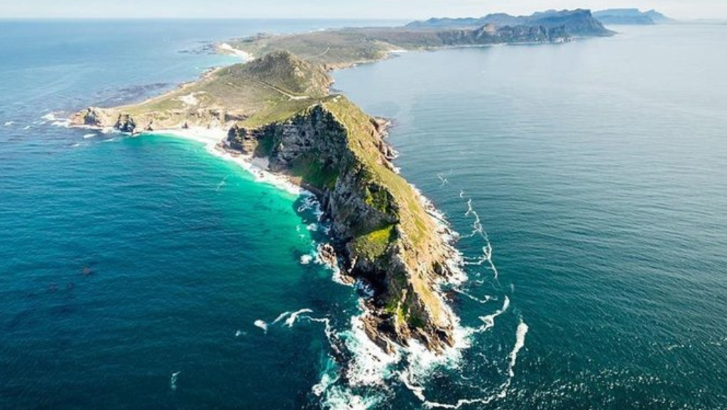 Cape Point and Cape of Good Hope aerial view in South Africa with rugged coastal cliffs, Atlantic Ocean scenery and protected Cape Peninsula landscape