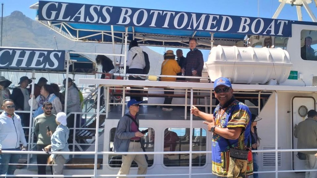 Glass bottom boat seal-watching tour in Hout Bay, one of the coastal experiences covered in Along the Shaws FAQs.