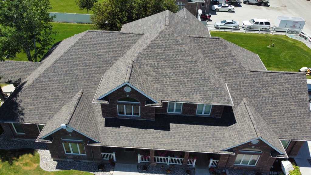 Local roofer repairing Utah home