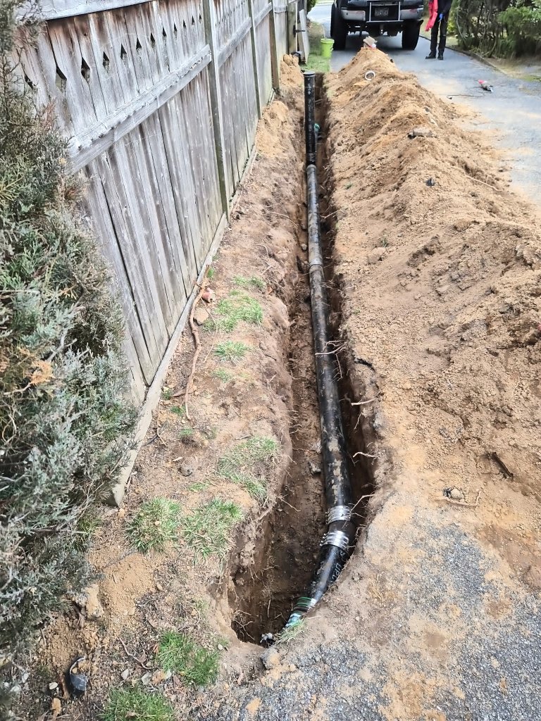 Sewer line replacement — trench excavation