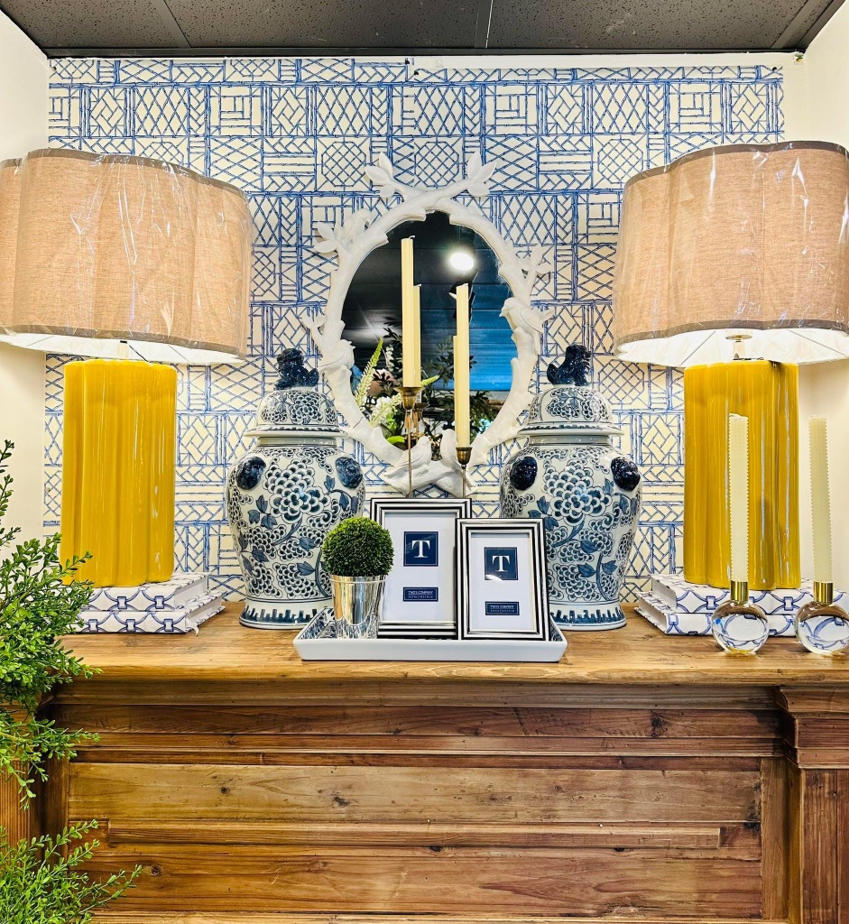 Twine and Teak store interior featuring peacock artwork and blue and white ceramics