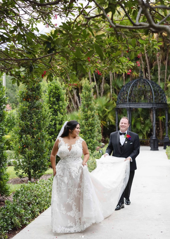 Wedding gown alterations with lace train at Bridal and Couture Alterations Boynton Beach