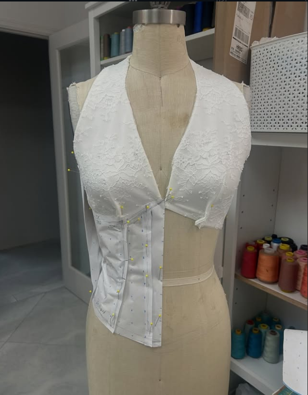 Custom bridal corset being pinned and fitted on dress form at Bridal and Couture Alterations Boynton Beach, custom couture dress work