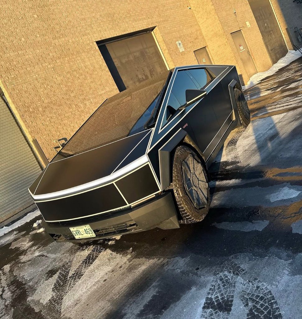 Tesla Cybertruck Tron wrap — full satin black with reflective strips