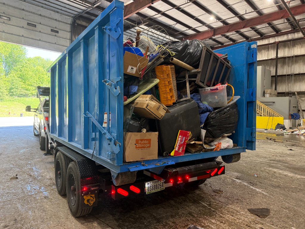 Dump trailer filled with household waste