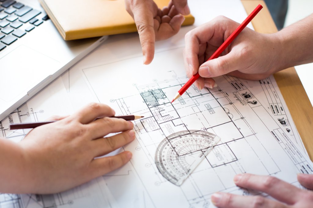 Architects reviewing a blueprint