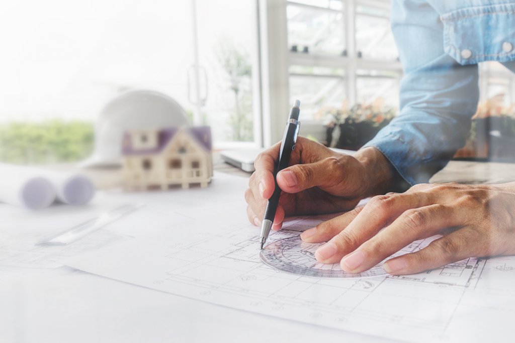 Architect working on a blueprint