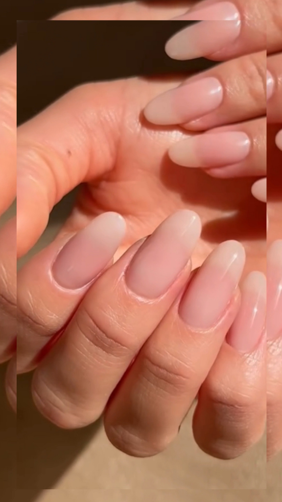 Milky pink manicured nails