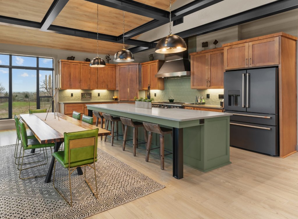 Olive green custom kitchen island with wood cabinetry by CJ Cabinets in San Antonio