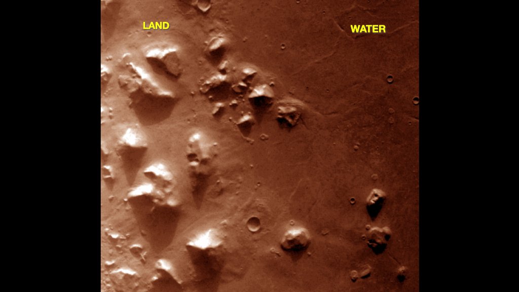Cydonia region orbital view: the transition between high-relief land and the flat basin where water may once have stood.