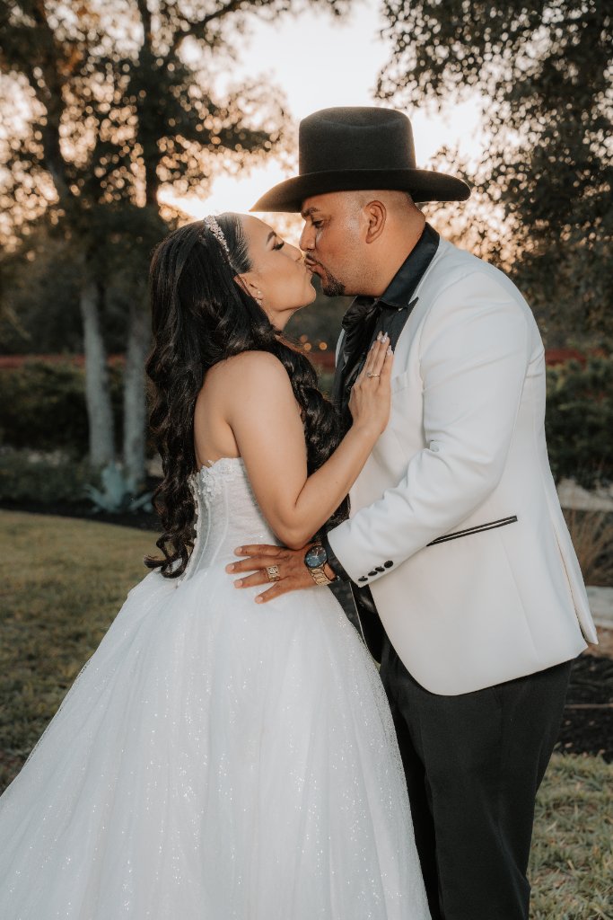 Bride and groom in close embrace