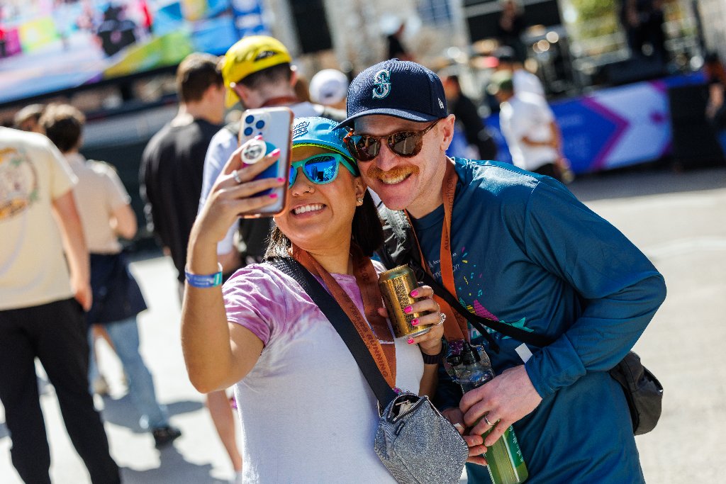 Couple taking a selfie at the race expo