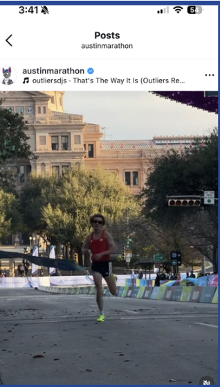 Instagram post of runner at finish line with Capitol