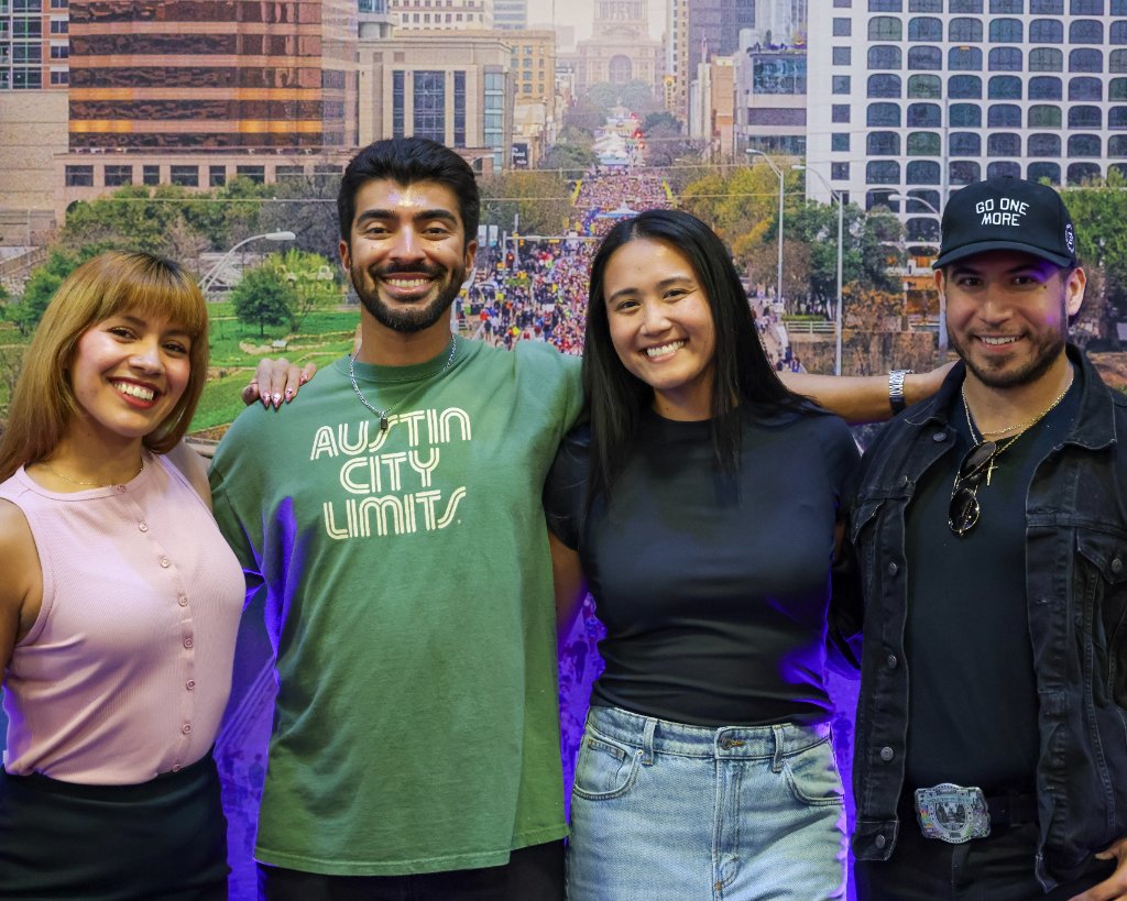 Attendees engaging at Austin Marathon event