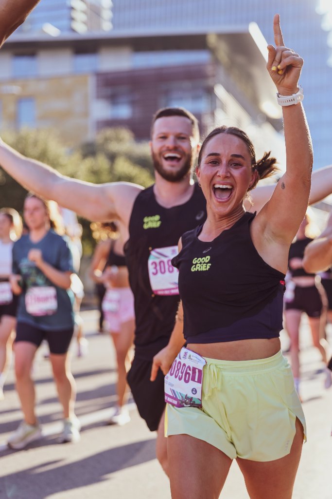Runners celebrating on course
